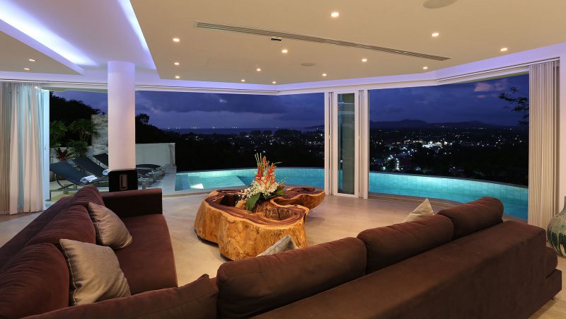 villa beyond's luxurious living area overlooking the infinity swimming pool