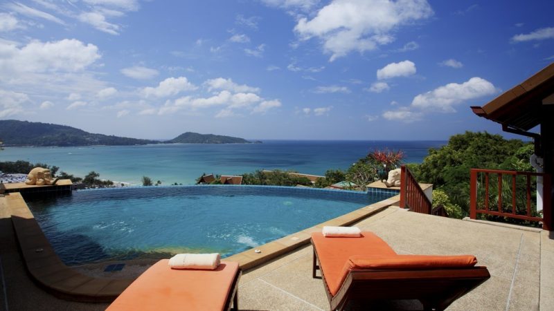 gorgeous villa overlooks a stunning landscape of the Andaman Sea and tropical greenery
